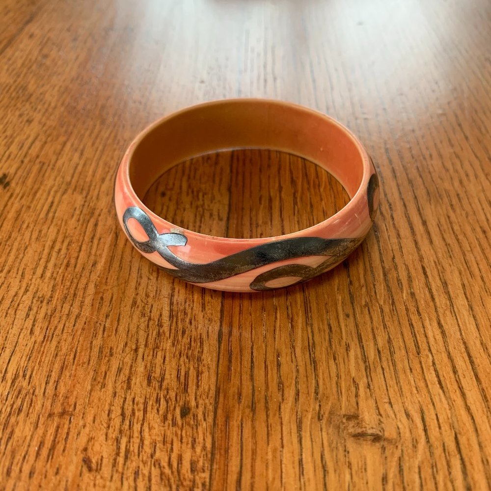 Vintage plastic bracelet which Sterling silver